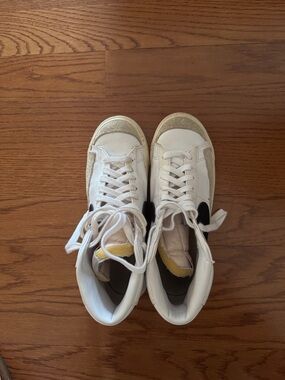 Nike White High-Top Sneakers with Black Swoosh and Cream Accents